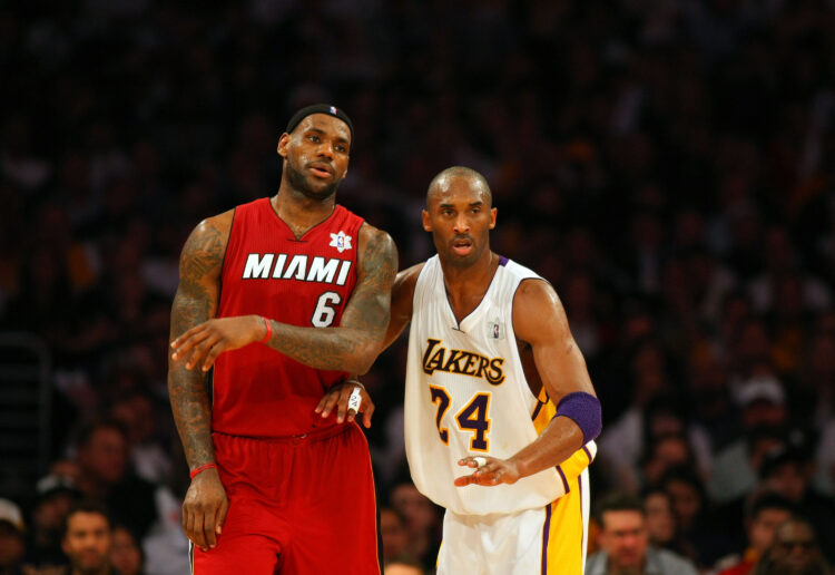 Kobe Bryant #24 of the Los Angeles Lakers defends LeBron James #6 of the Miami Heat during the NBA game