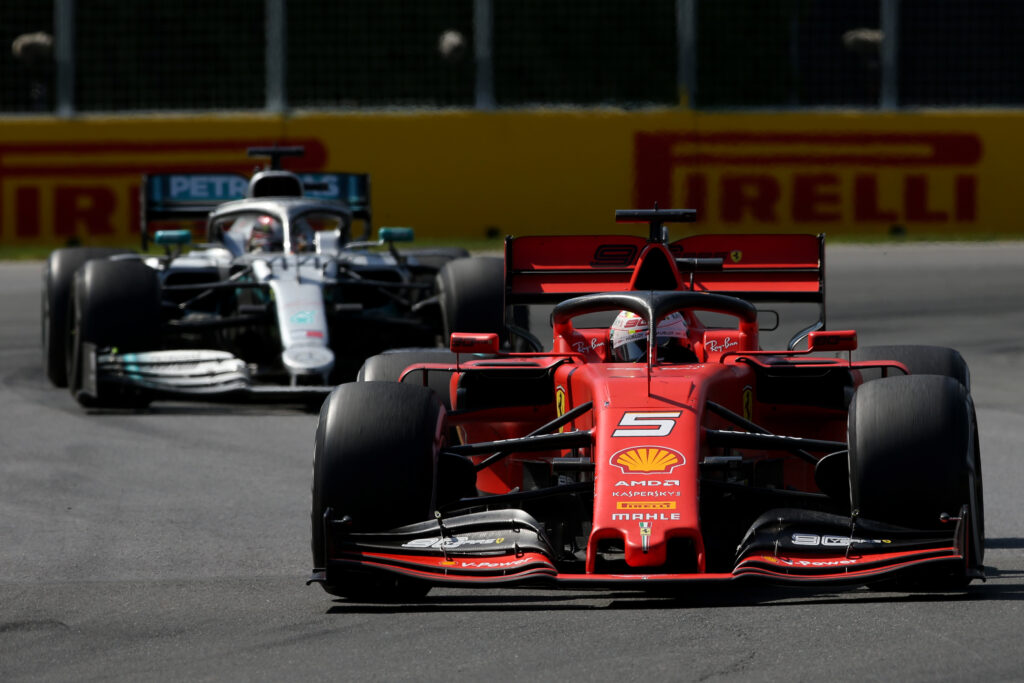 Ferrari's Sebastian Vettel is followed by the Mercedes of Lewis Hamilton during the 2019 Canadian Grand Prix.