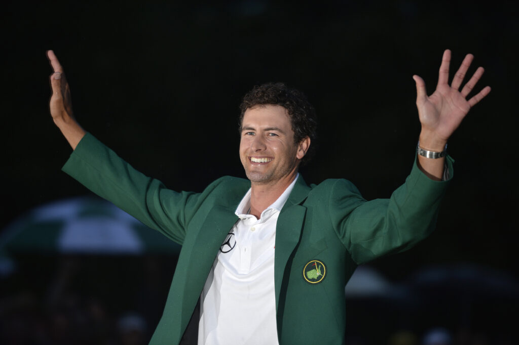 Adam Scott of Australia celebrates in his green jacket after winning the 2013 Masters.