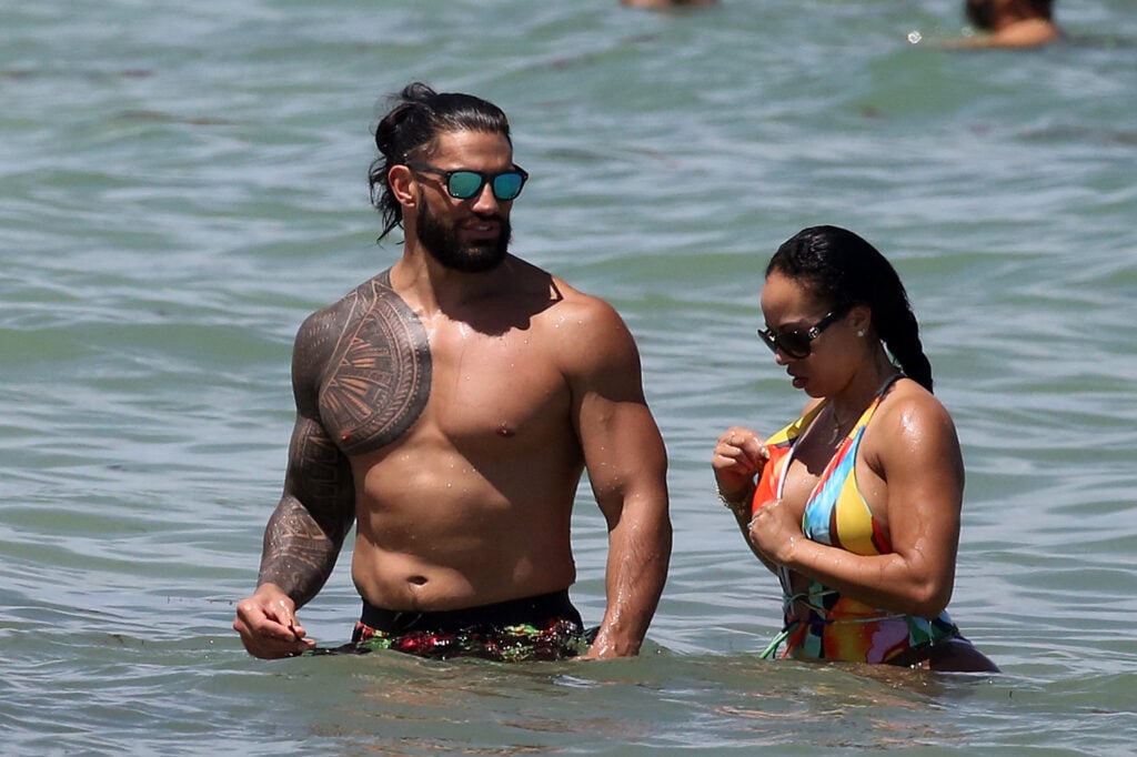 Roman Reigns and his wife, Galina Becker, on Miami beach in 2021