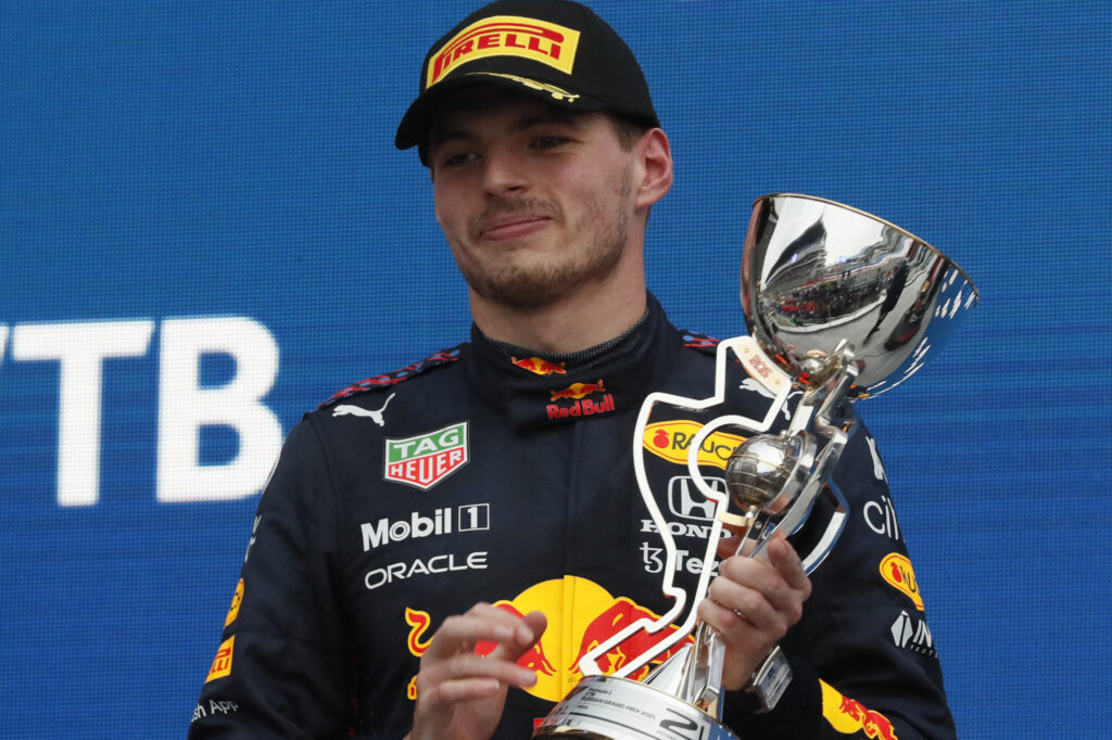 Verstappen smiles as he takes the second-place trophy at the 2021 Russian Grand Prix