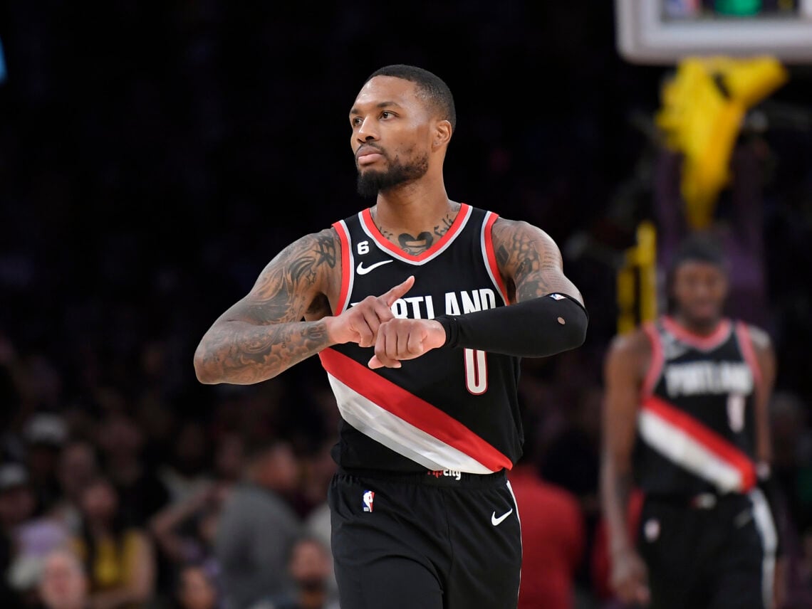 Damian Lillard #0 of the Portland Trail Blazers celebrates as he points to his wrist