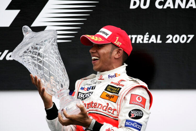 Lewis Hamilton of McLaren lifts the 1st place trophy after winning the 2007 Canadian Grand Prix