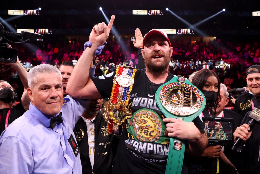 Tyson Fury celebrates his win against Deontay Wilder