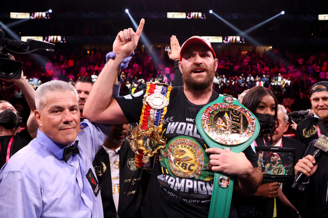 Tyson Fury celebrates his win against Deontay Wilder