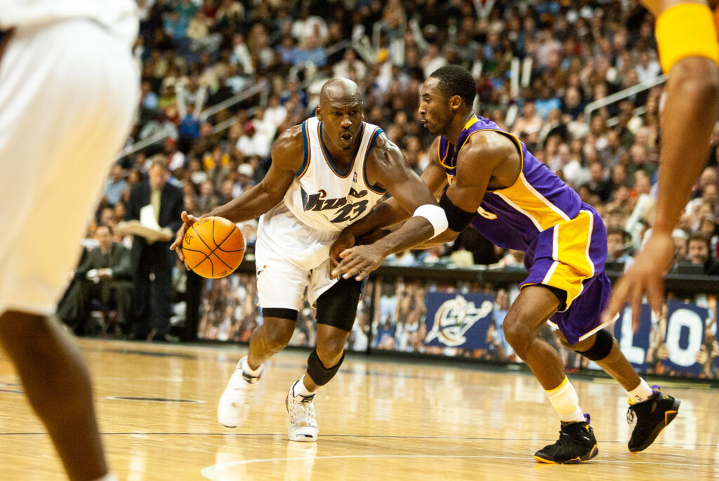 Michael Jordan of the Washington Wizards and Kobe Bryant of the L.A.Lakers in action