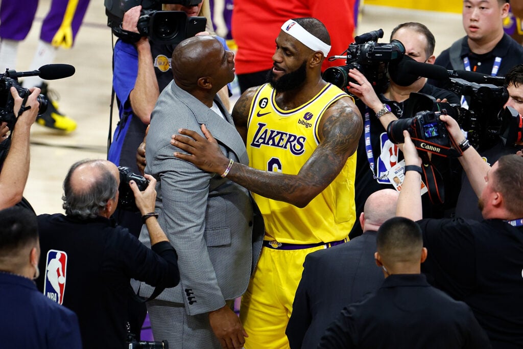 Lakers legend Magic Johnson with LeBron James as James overtook former Laker Kareem Abdul-Jabbar as the NBA's all-time leading scorer.