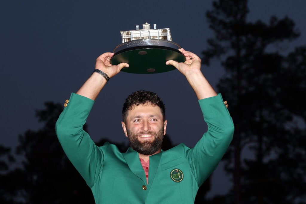 Jon Rahm lifts trophy after winning 2023 Masters