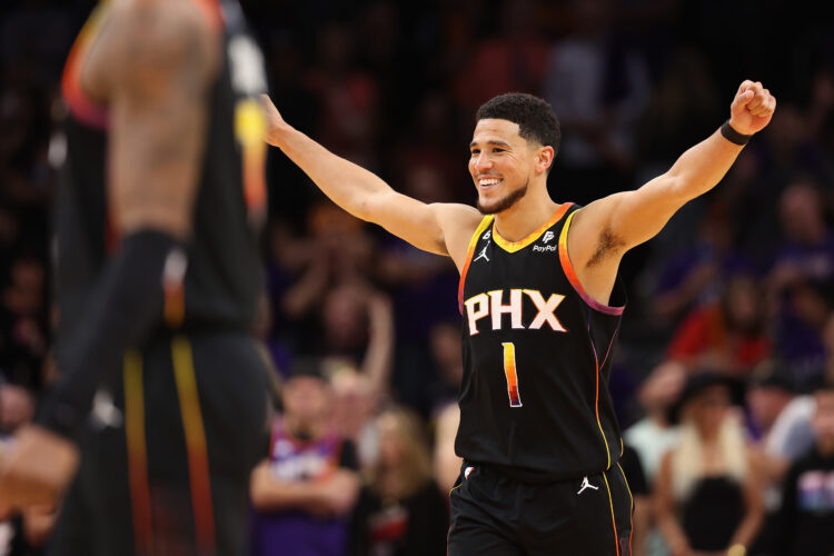 Devin Booker #1 of the Phoenix Suns celebrates