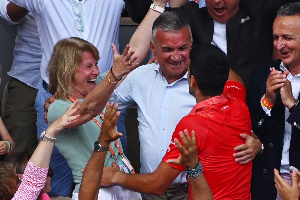 Novak Djokovic celebrating with his parents at the 2023 French Open