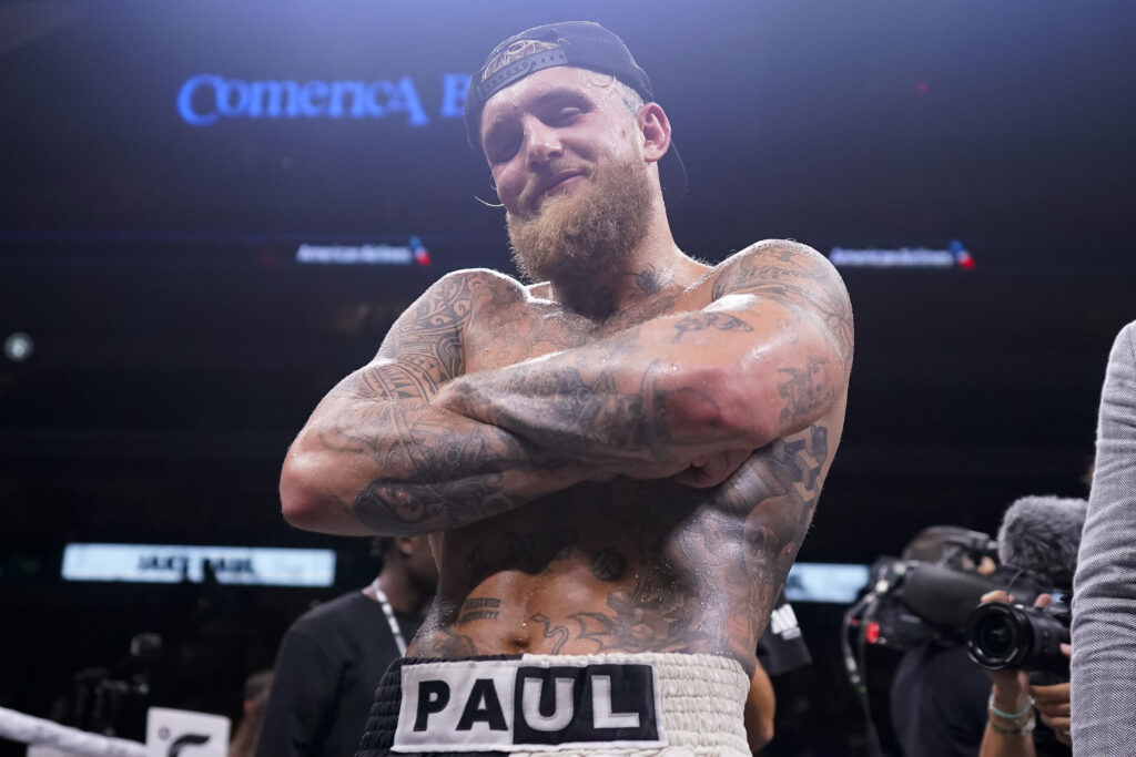 Jake Paul poses for a photo after defeating Nate Diaz