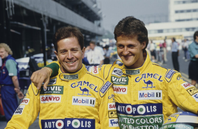 Michael Schumacher with his arm around Martin Brundle in the pit lane of the 1992 Mexican Grand Prix