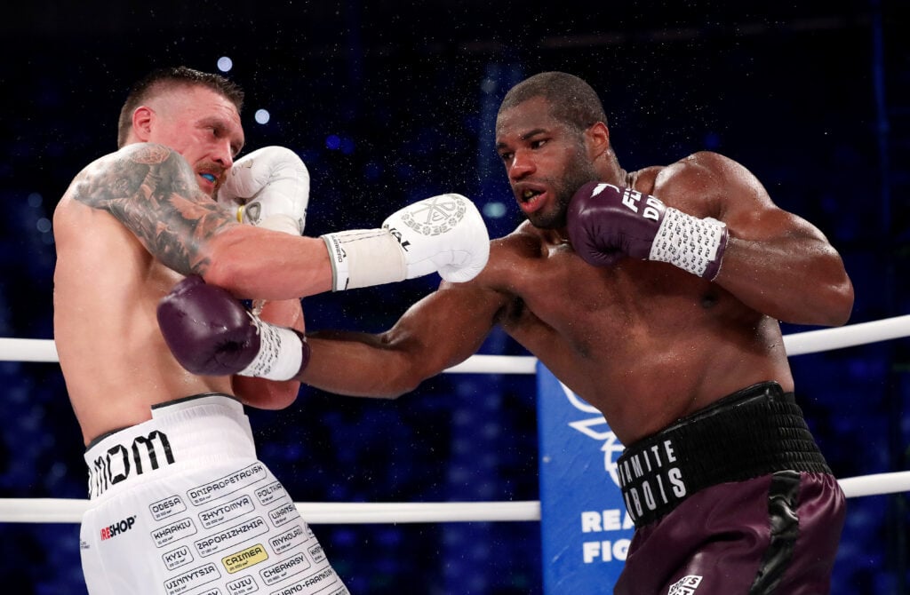 Daniel Dubois tries to land a punch on Oleksandr Usyk during their fight in Wroclaw, Poland