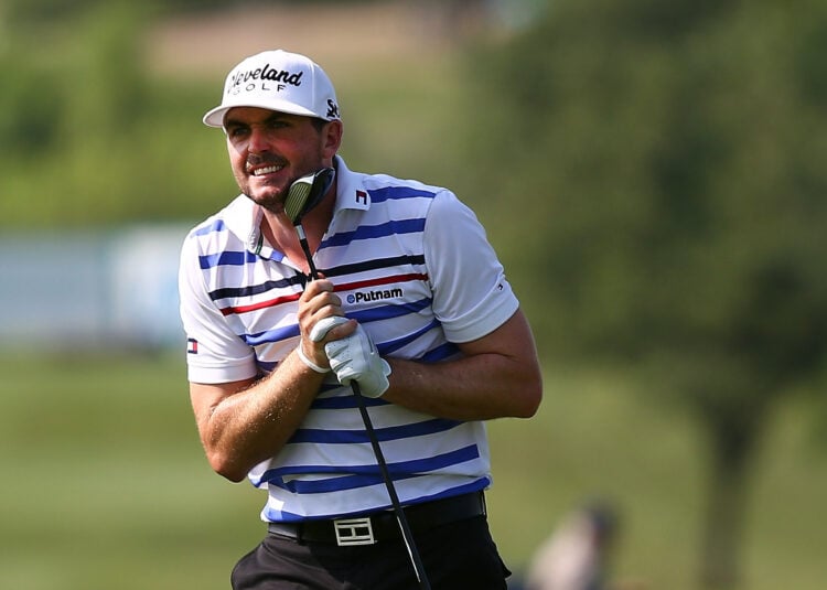 Bradley reacts to a shot during the 2013 Byron Nelson Championship