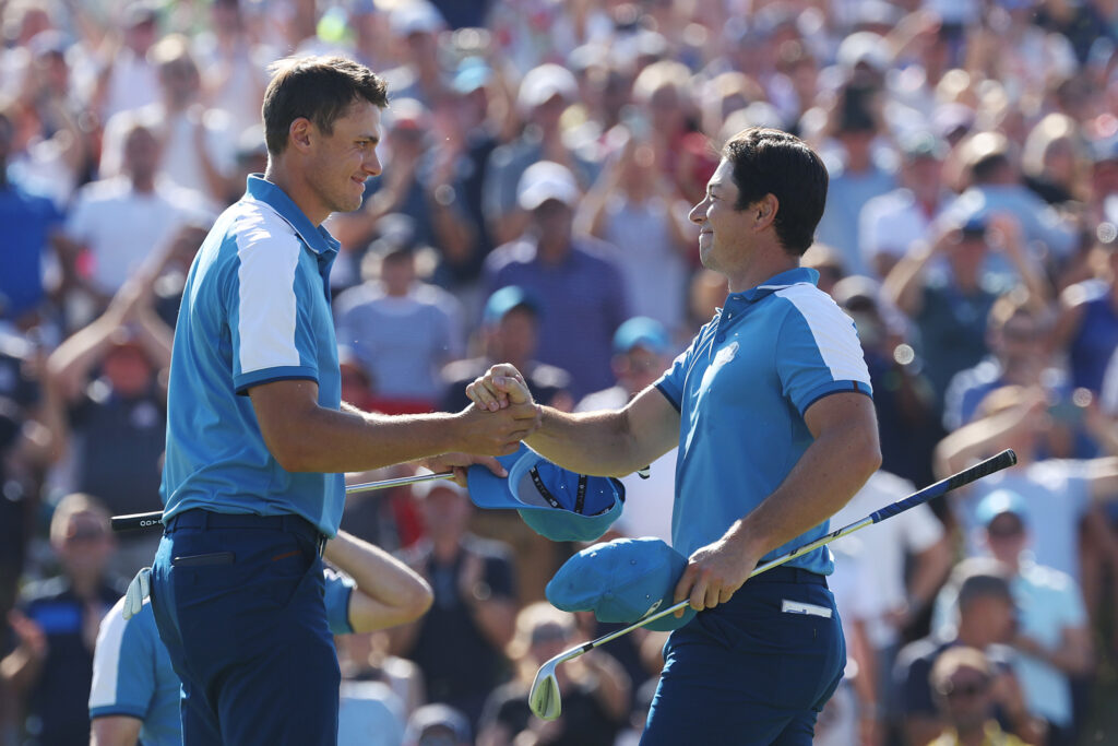 Ludvig Aberg and Viktor Hovland of Team Europe celebrate