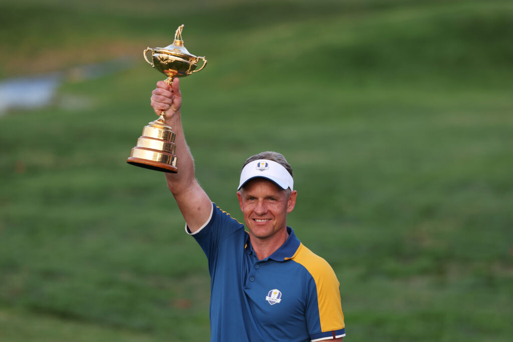 Luke Donald, Captain of Team Europe poses for a photograph with the Ryder Cup trophy
