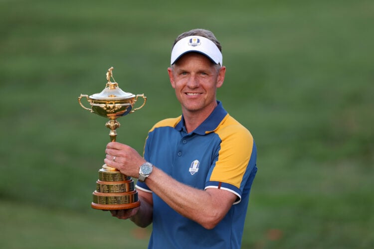 Team Europe Captain Luke Donald holds the Ryder Cup trophy