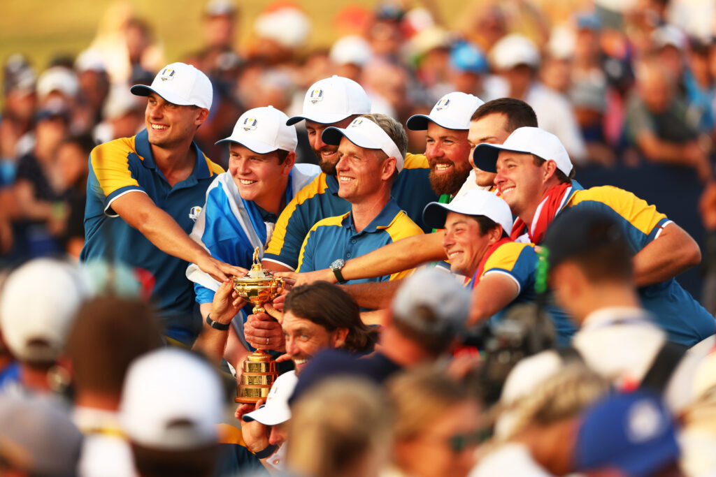 Team Europe Captain Luke Donald lifts the Ryder Cup.
