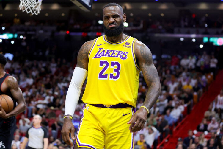 LeBron James #23 of the Los Angeles Lakers reacts after being fouled against the Miami Heat