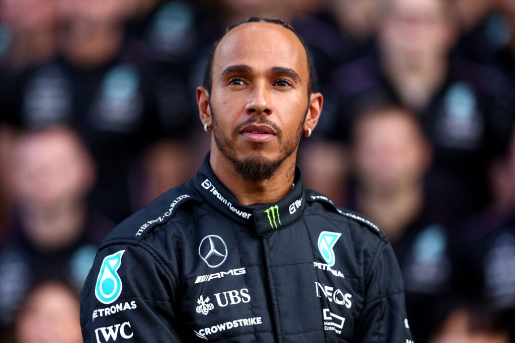 Lewis Hamilton of Great Britain looks on