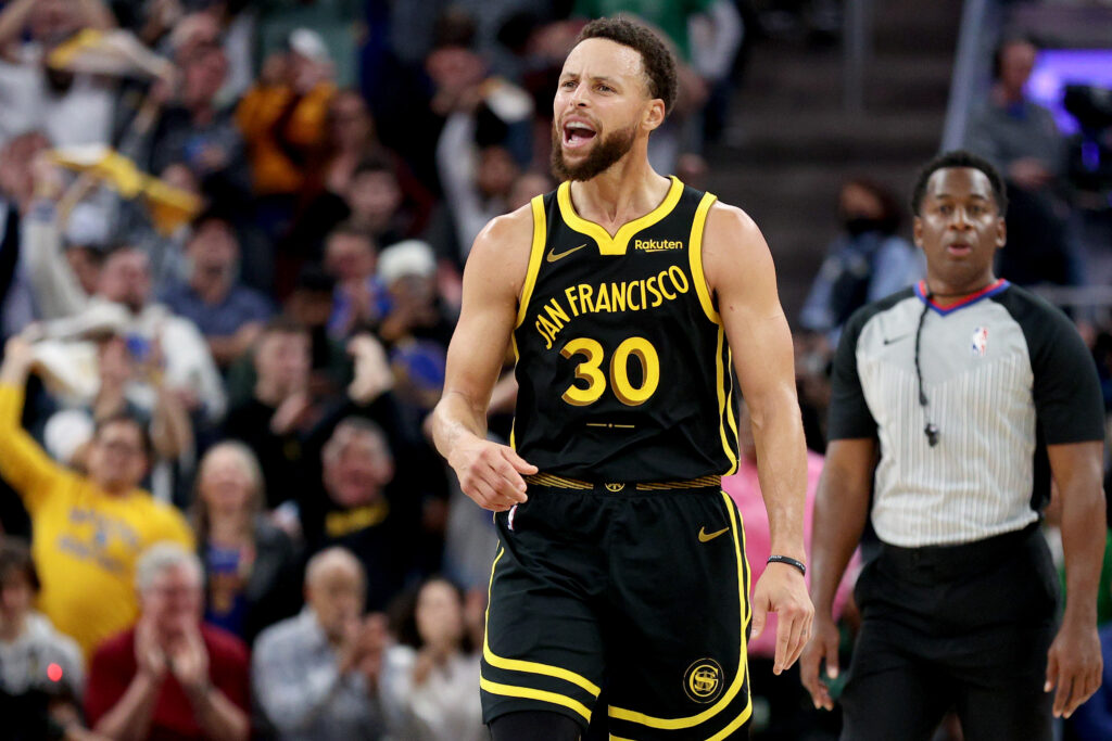 Stephen Curry #30 of the Golden State Warriors reacts during a game