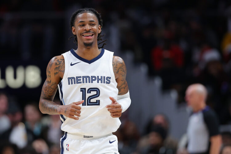 Ja Morant #12 of the Memphis Grizzlies smiles in an NBA game