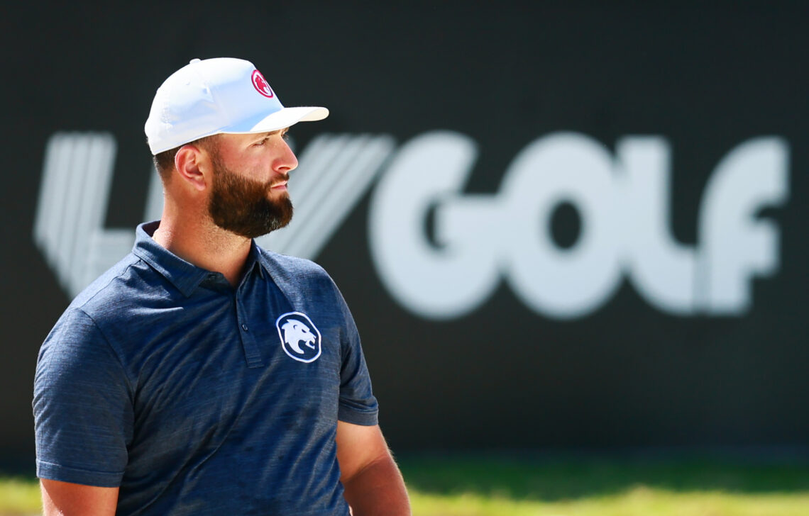 Jon Rahm of Legion XIII warms up in the practice area