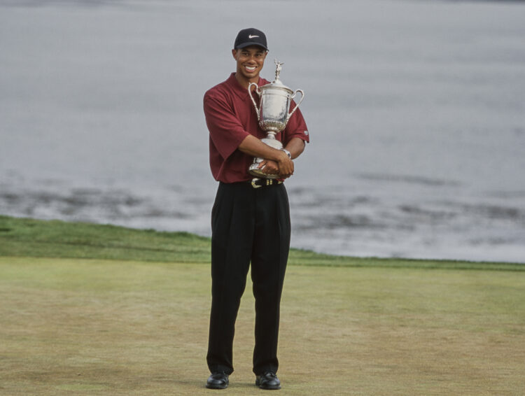 Tiger Woods celebrates after winning the 100th US Open Golf Championship