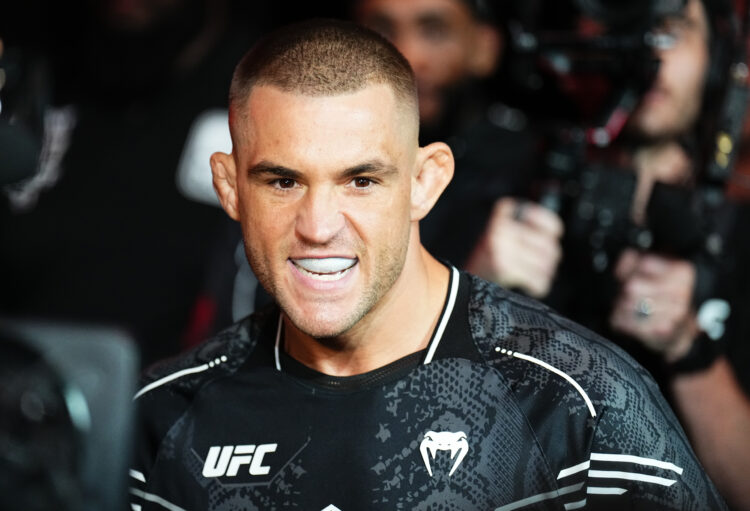 Dustin Poirier walks to the Octagon to fight Benoit Saint Denis at UFC 299 in 2024