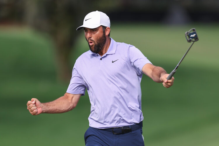 Scottie Scheffler of the United States celebrates after making birdie