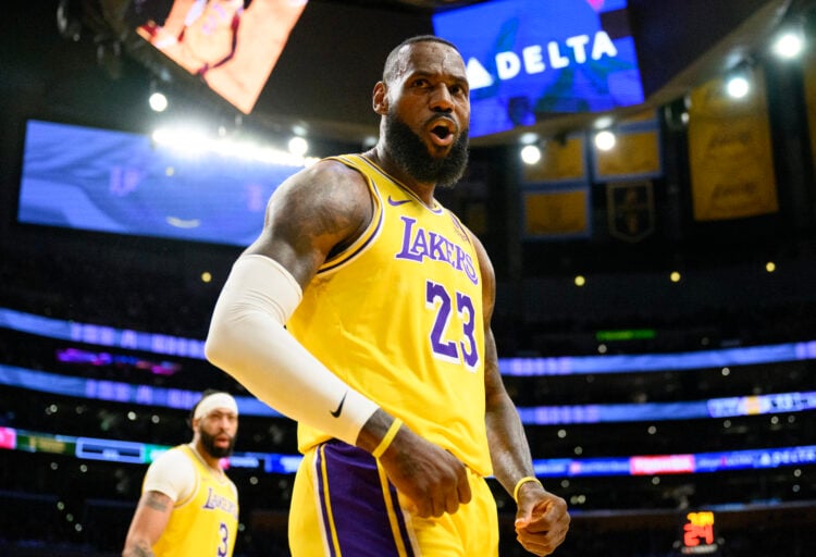 Los Angeles Lakers forward LeBron James (23) reacts to a score