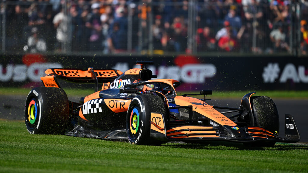 Oscar Piastri driving the McLaren runs wide onto the grass during the F1 Grand Prix of Australia
