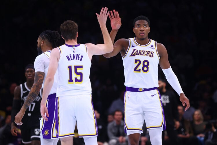 Rui Hachimura #28 and Austin Reaves #15 of the Los Angeles Lakers celebrate