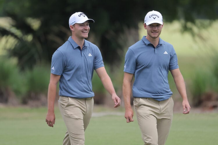 Nicolai Højgaard and Rasmus Højgaard of Denmark look on during the first round of the Zurich Classic