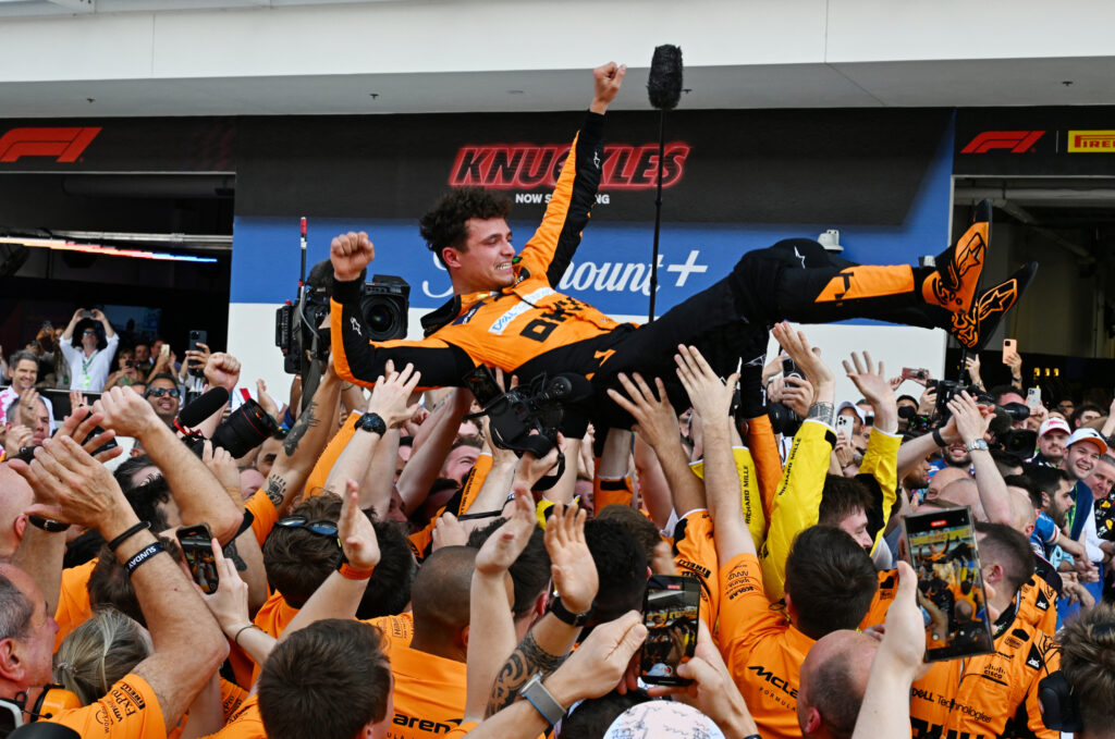 Lando Norris is tossed in the air as his team celebrates his victory in the 2024 Miami Formula One Grand Prix
