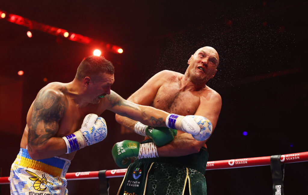 Oleksandr Usyk punches Tyson Fury