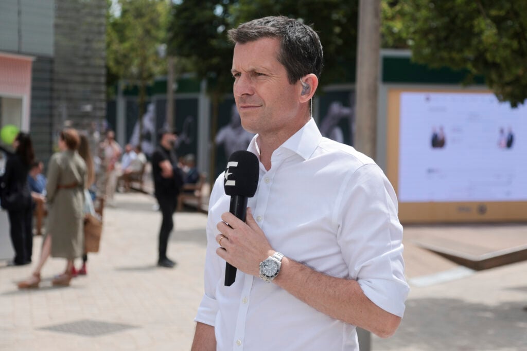 Tim Henman on punditry duty for Eurosport at Roland Garros in 2024