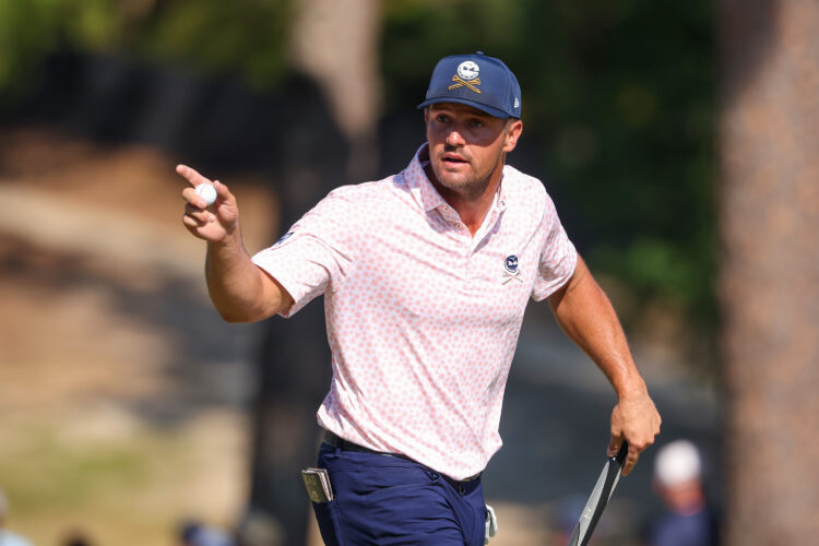 Bryson DeChambeau of the United States reacts after making a birdie