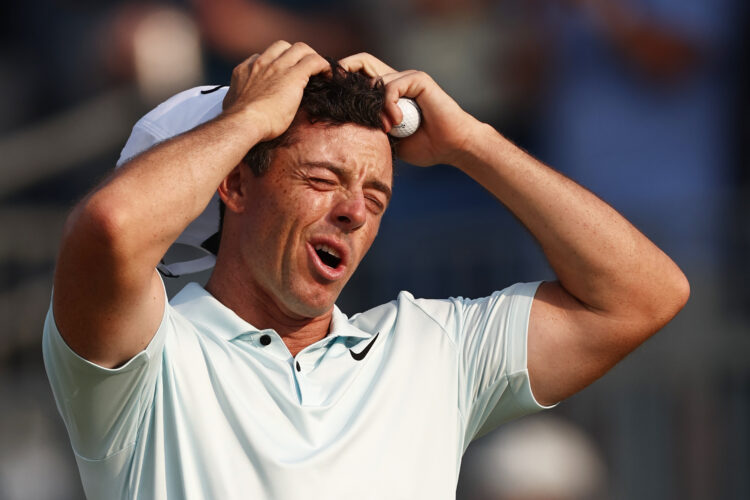 Rory McIlroy of Northern Ireland reacts after finishing the 18th hole during the final round of the 124th U.S. Open