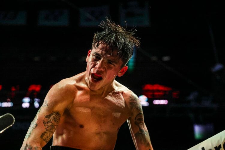 Jesse 'Bam' Rodriguez celebrates beating Juan Francisco El 'Gallo' Estrada in the Ring Magazine super flyweight title fight