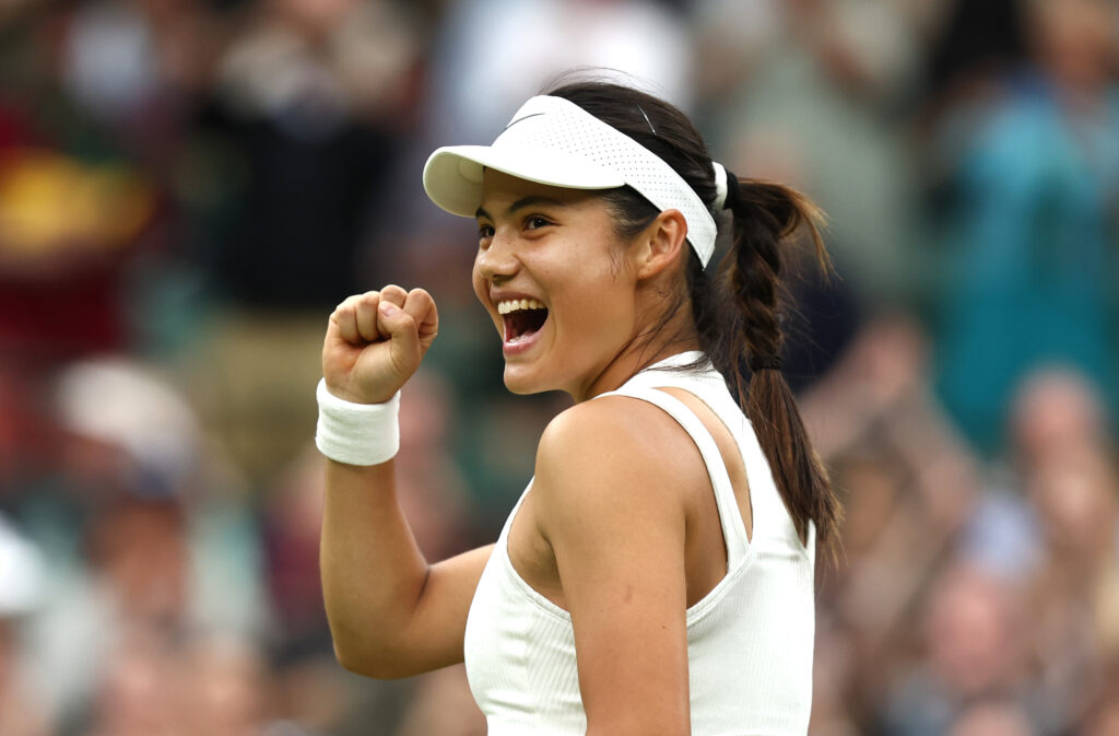 Emma Raducanu celebrating defeating Elise Mertens at Wimbledon 2025