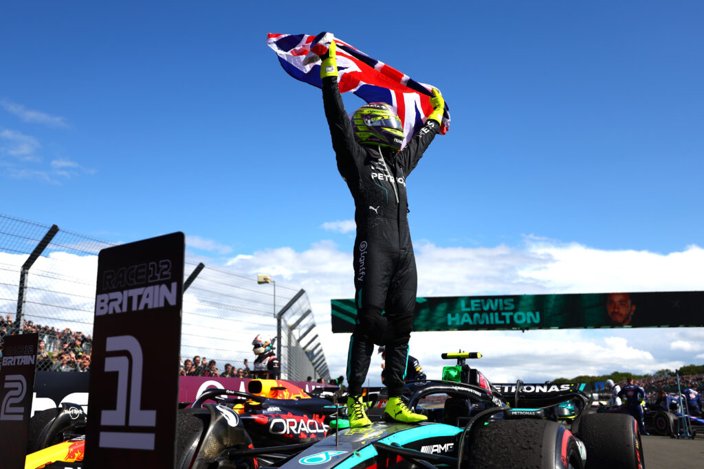Race winner Lewis Hamilton of Great Britain and Mercedes celebrates in parc ferme during the F1 Grand Prix of Great Britain at Silverstone Circuit