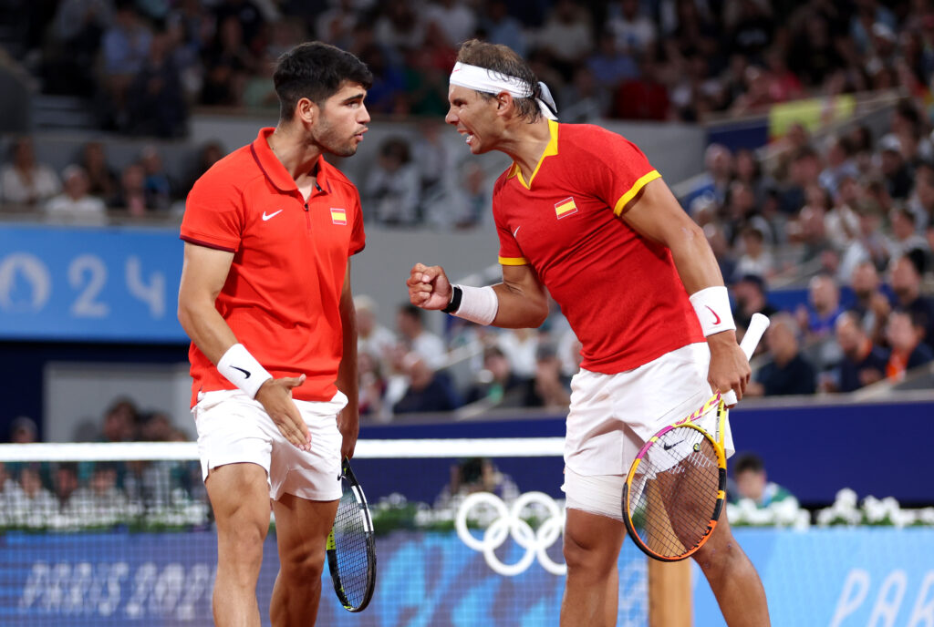 Carlos Alcaraz and Rafael Nadal playing at the 2024 Paris Olympics