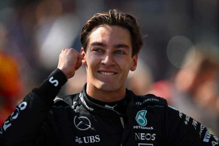 George Russell celebrates in parc ferme after winning the 2024 Belgian Grand Prix