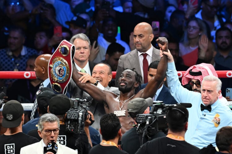 Terence Crawford lifts title belt after beating Israil Madrimov