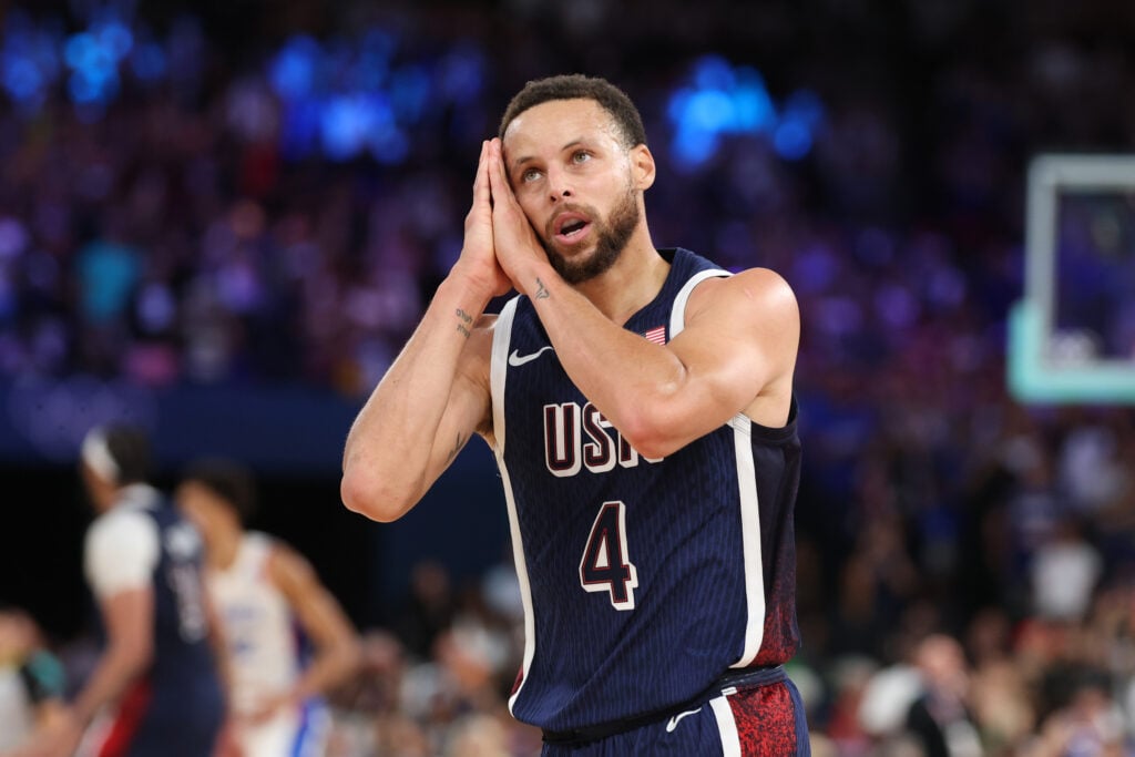 Stephen Curry #4 of Team United States reacts after a three point basket
