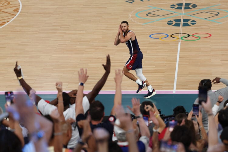Stephen Curry hits the "night night" celebration to the delight of the crowd at the 2024 Paris Olympics.