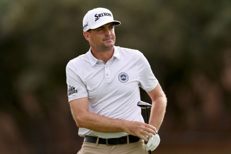Keegan Bradley of the United States looks on.