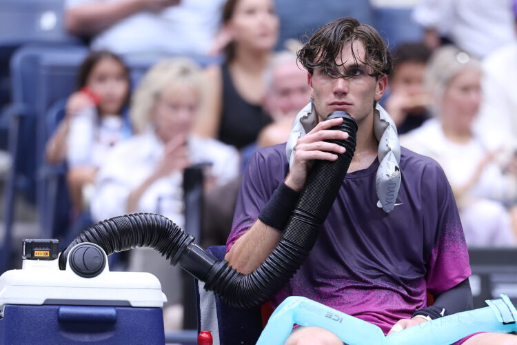 Jack Draper rests during a changeover against Jannik Sinner in the semifinals of the 2024 US Open.