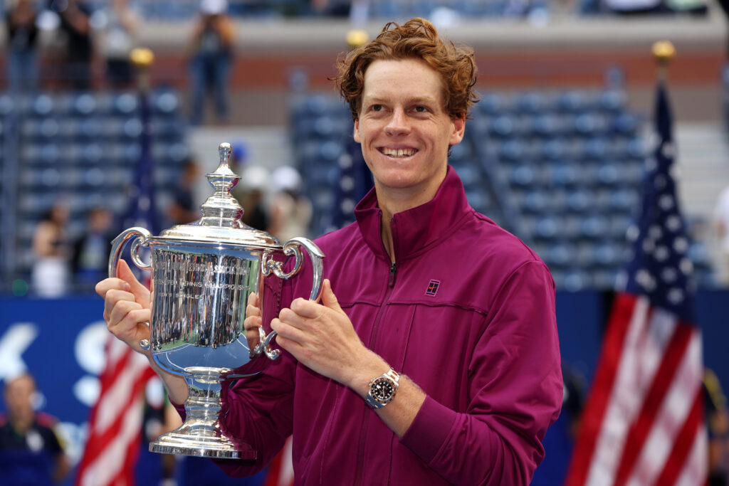 Jannik Sinner holds the US Open trophy after beating Taylor Fritz in the 2024 final.
